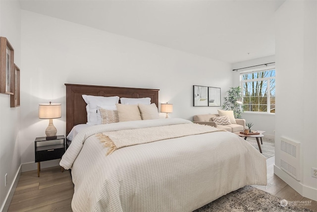 bedroom featuring wood-type flooring