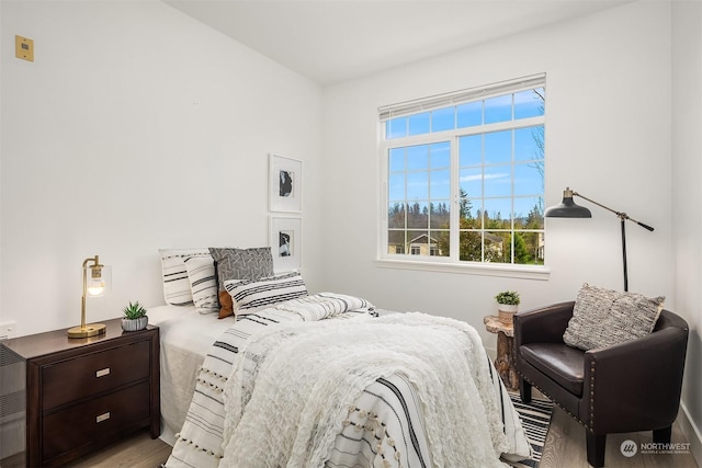 bedroom featuring light wood-type flooring