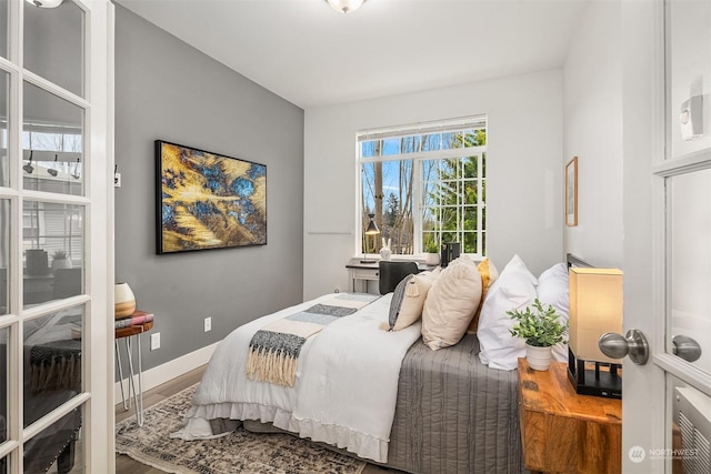 bedroom with wood-type flooring