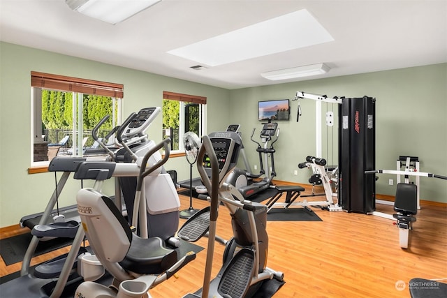 exercise room featuring hardwood / wood-style flooring