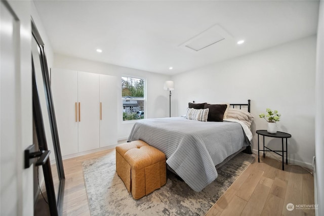 bedroom with wood-type flooring