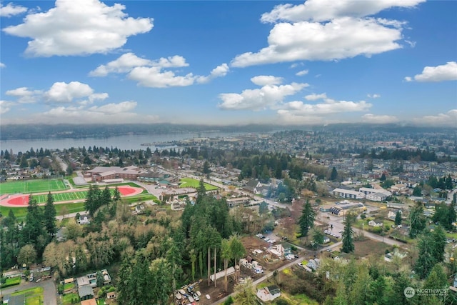 bird's eye view with a water view