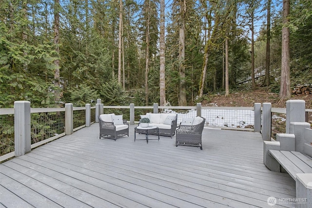 wooden deck with an outdoor hangout area