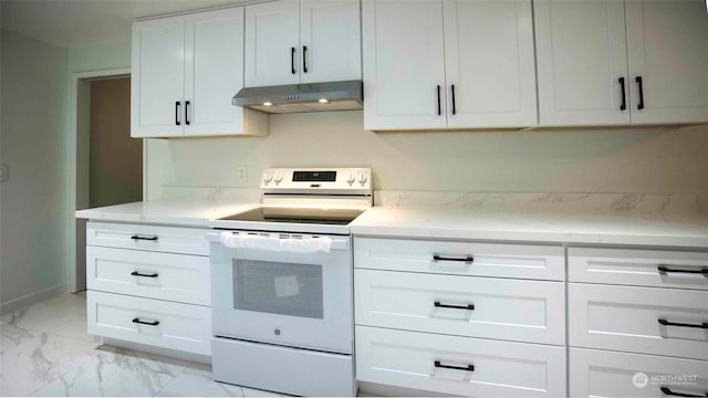 kitchen with light stone countertops, electric stove, white cabinets, and extractor fan