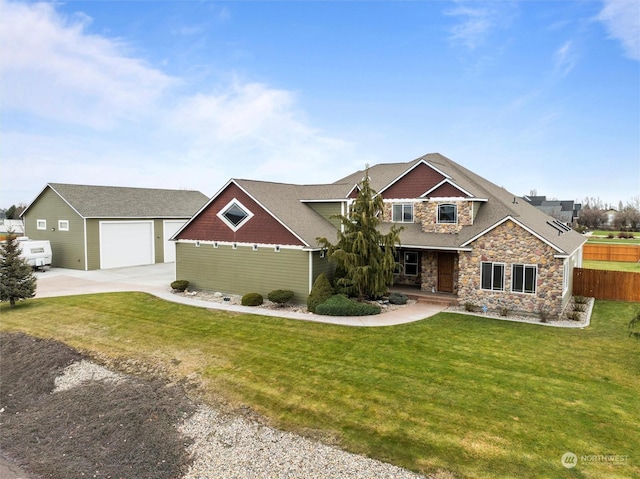 craftsman-style house featuring a garage and a front yard