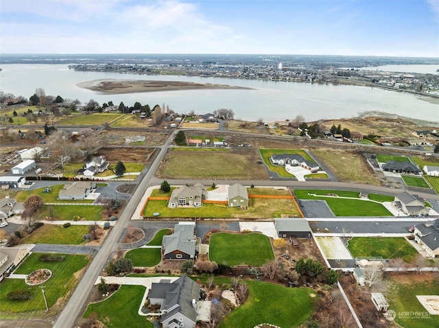 bird's eye view with a water view