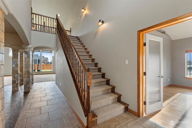 stairway with decorative columns