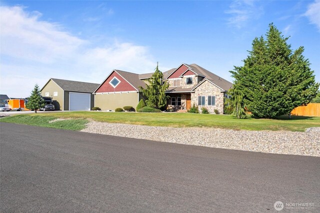527 Rd I.6 NE, Moses Lake, WA 98837 - craftsman inspired home featuring stone siding, a garage, a front yard, and driveway