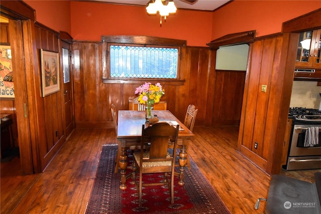 dining space featuring dark hardwood / wood-style floors