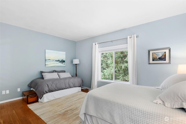 bedroom featuring hardwood / wood-style flooring