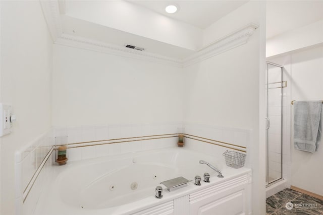 bathroom with shower with separate bathtub