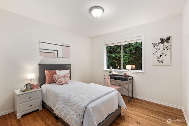 bedroom featuring light hardwood / wood-style floors