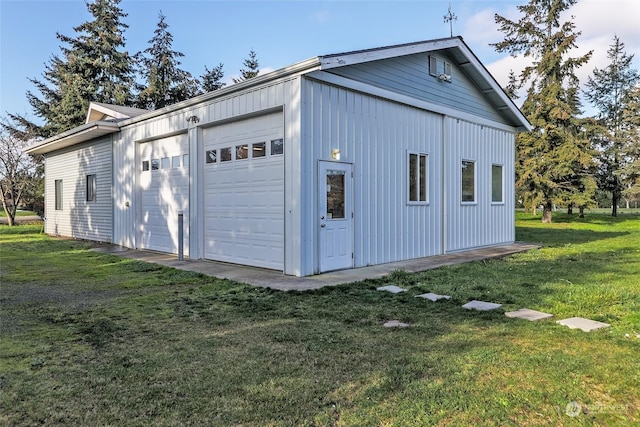 garage with a lawn