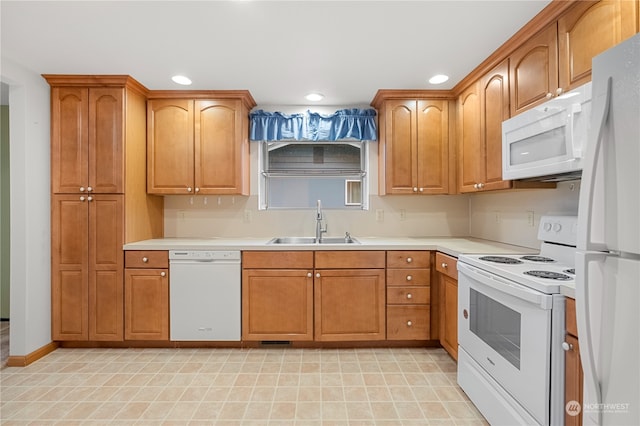 kitchen with sink and white appliances