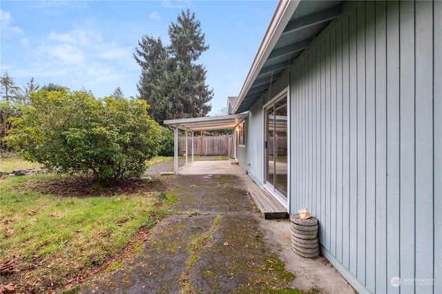 view of property exterior featuring a patio area