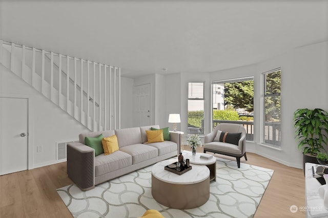 living room with light hardwood / wood-style floors