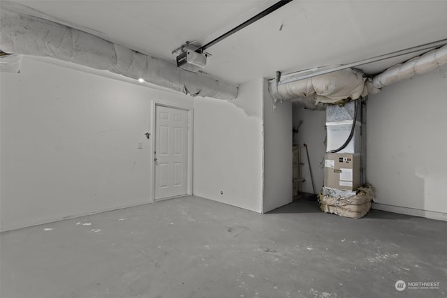 garage with heating unit and a garage door opener