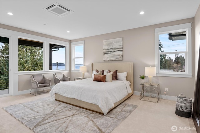 bedroom with recessed lighting, visible vents, and carpet flooring