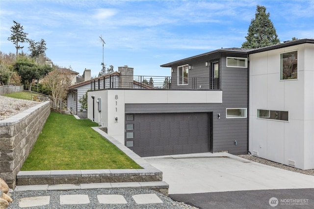 exterior space featuring a balcony, fence, concrete driveway, a front lawn, and a garage