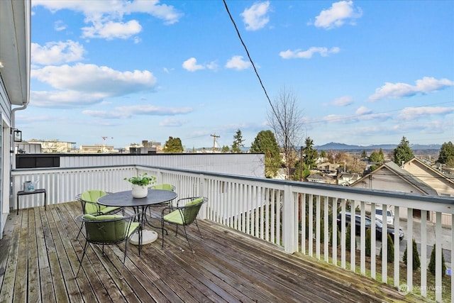 wooden terrace featuring a mountain view