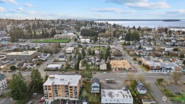 birds eye view of property featuring a water view