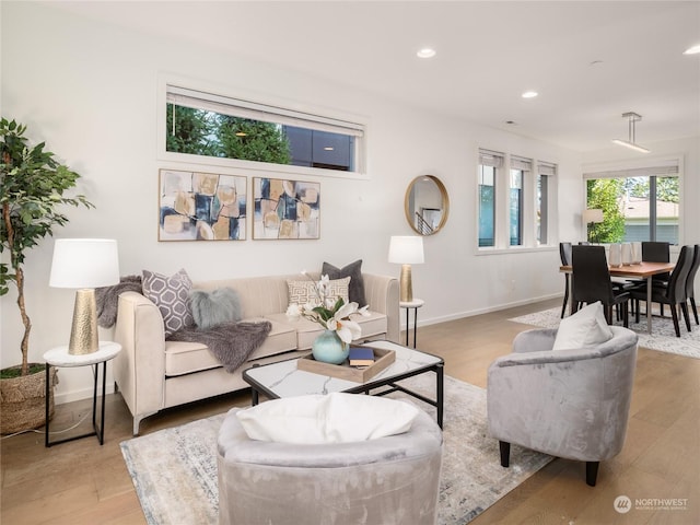 living room with light hardwood / wood-style floors