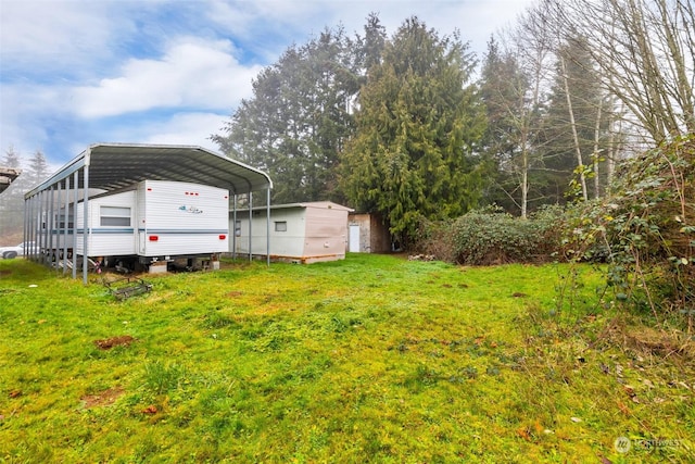 view of yard featuring a carport