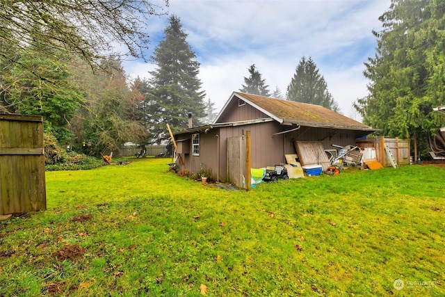 view of property exterior featuring a yard