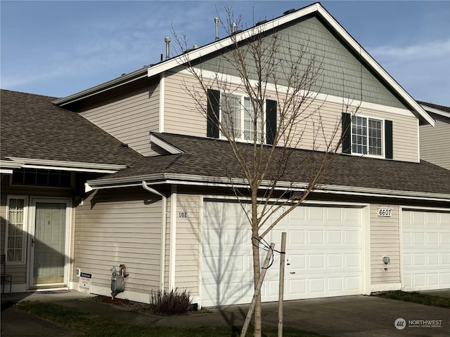 view of property exterior featuring a garage