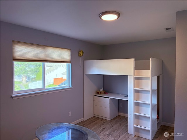 unfurnished bedroom featuring light hardwood / wood-style floors