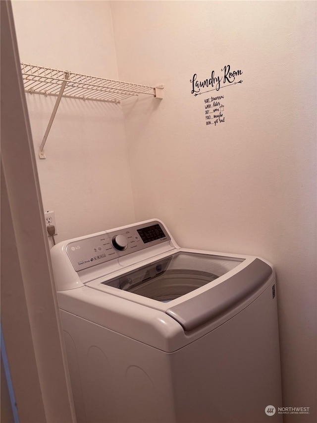 washroom featuring washer / dryer