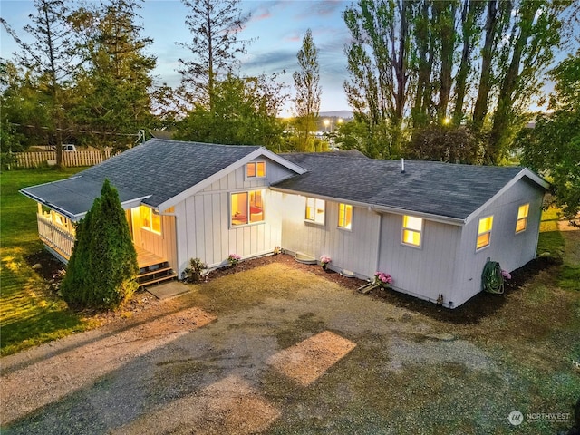 view of front of property with a wooden deck