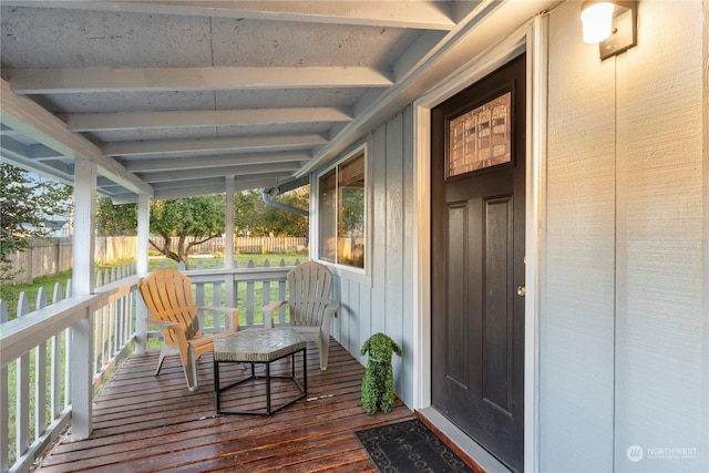 entrance to property with covered porch