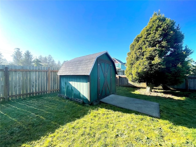 view of outdoor structure with a lawn