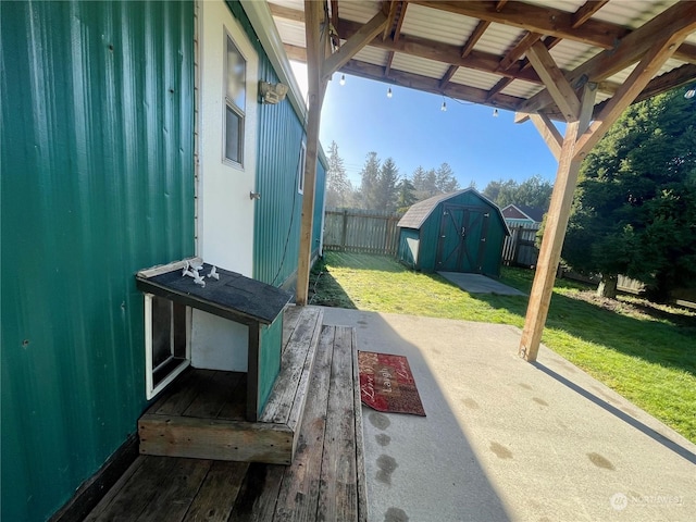 view of patio featuring a storage unit