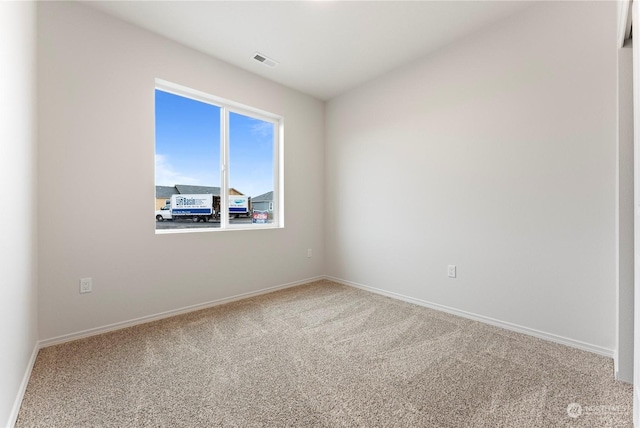 empty room with carpet floors