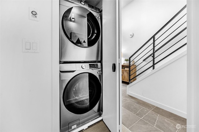 laundry room featuring stacked washing maching and dryer