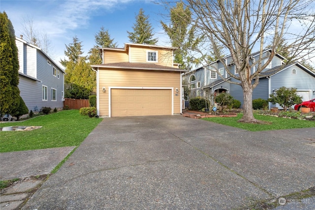 view of front property with a garage and a front lawn