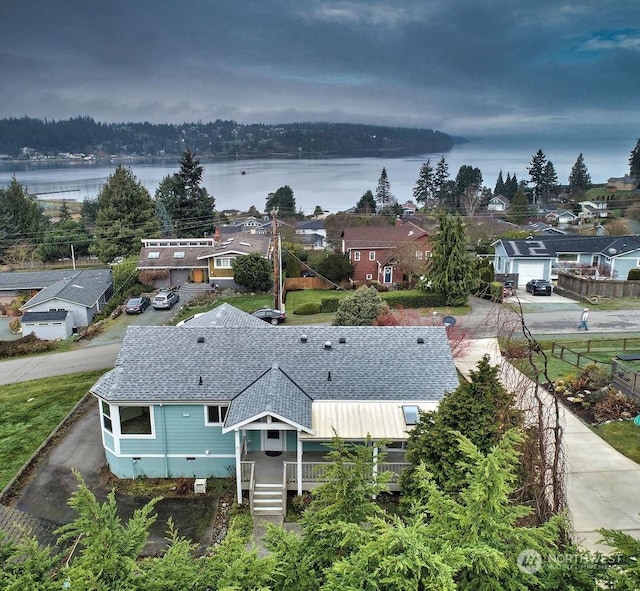 bird's eye view with a water view