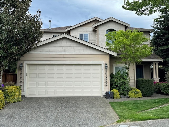 view of front of property with a garage