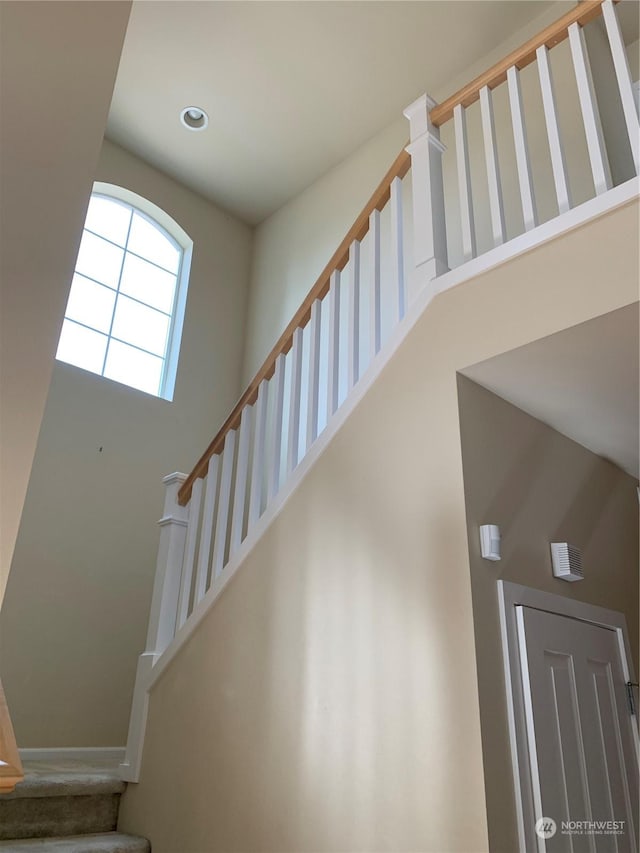 stairs with a high ceiling