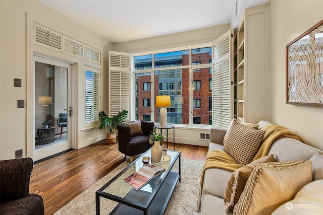 sitting room featuring hardwood / wood-style flooring