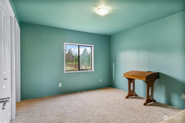 view of carpeted empty room