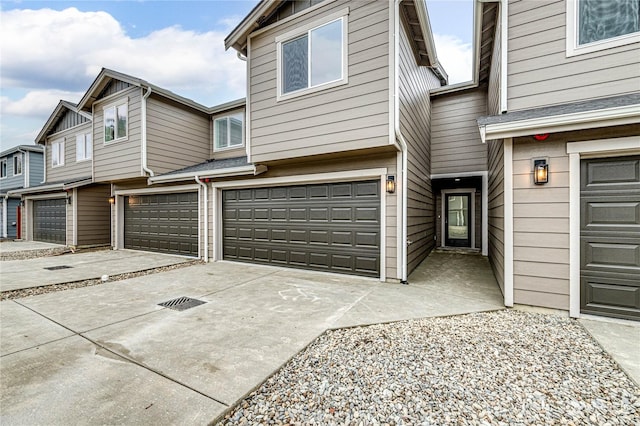 exterior space with a garage