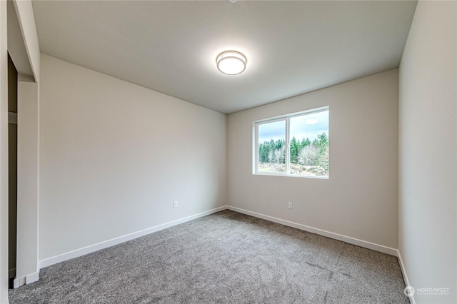 view of carpeted spare room