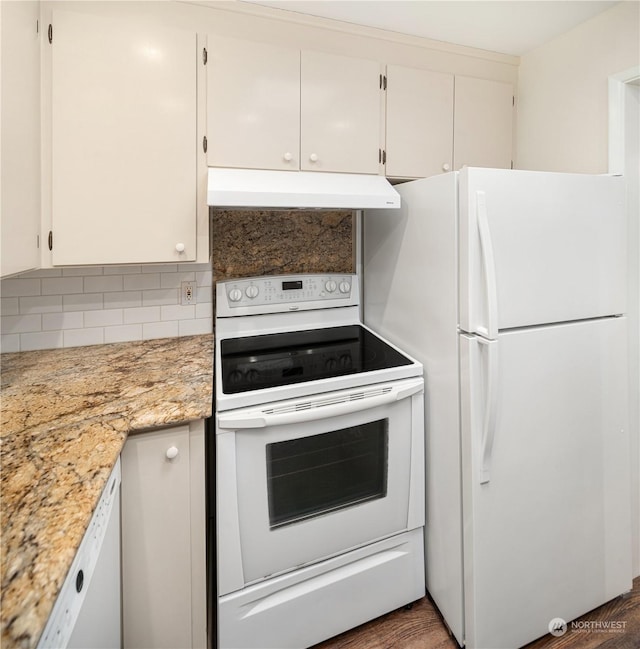 kitchen with white cabinetry, decorative backsplash, white appliances, dark hardwood / wood-style flooring, and light stone countertops