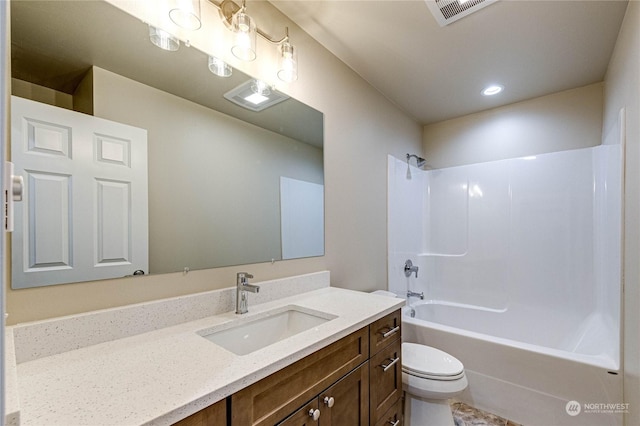 full bathroom featuring shower / tub combination, toilet, and vanity