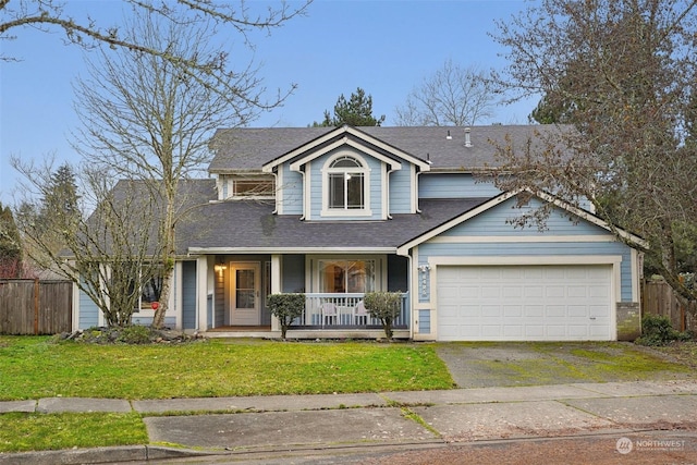 view of front of house with a porch, a front yard, and a garage