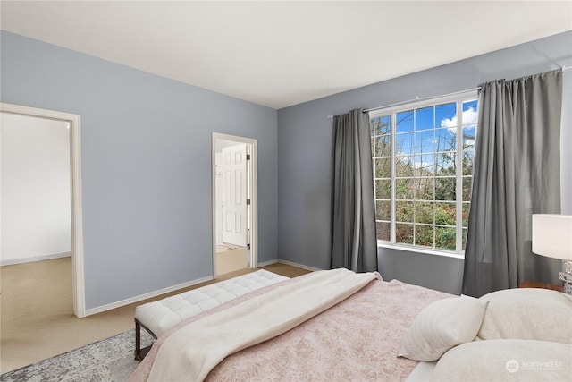 bedroom with light colored carpet