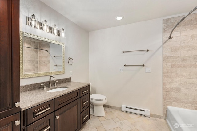 full bathroom featuring toilet, tiled shower / bath combo, a baseboard radiator, and vanity